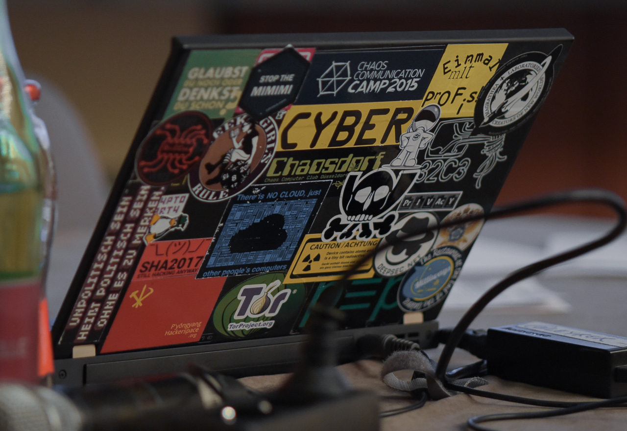 Laptop with stickers. Photographed at DeepSec 2018. © 2018 by Joanna Pianka.